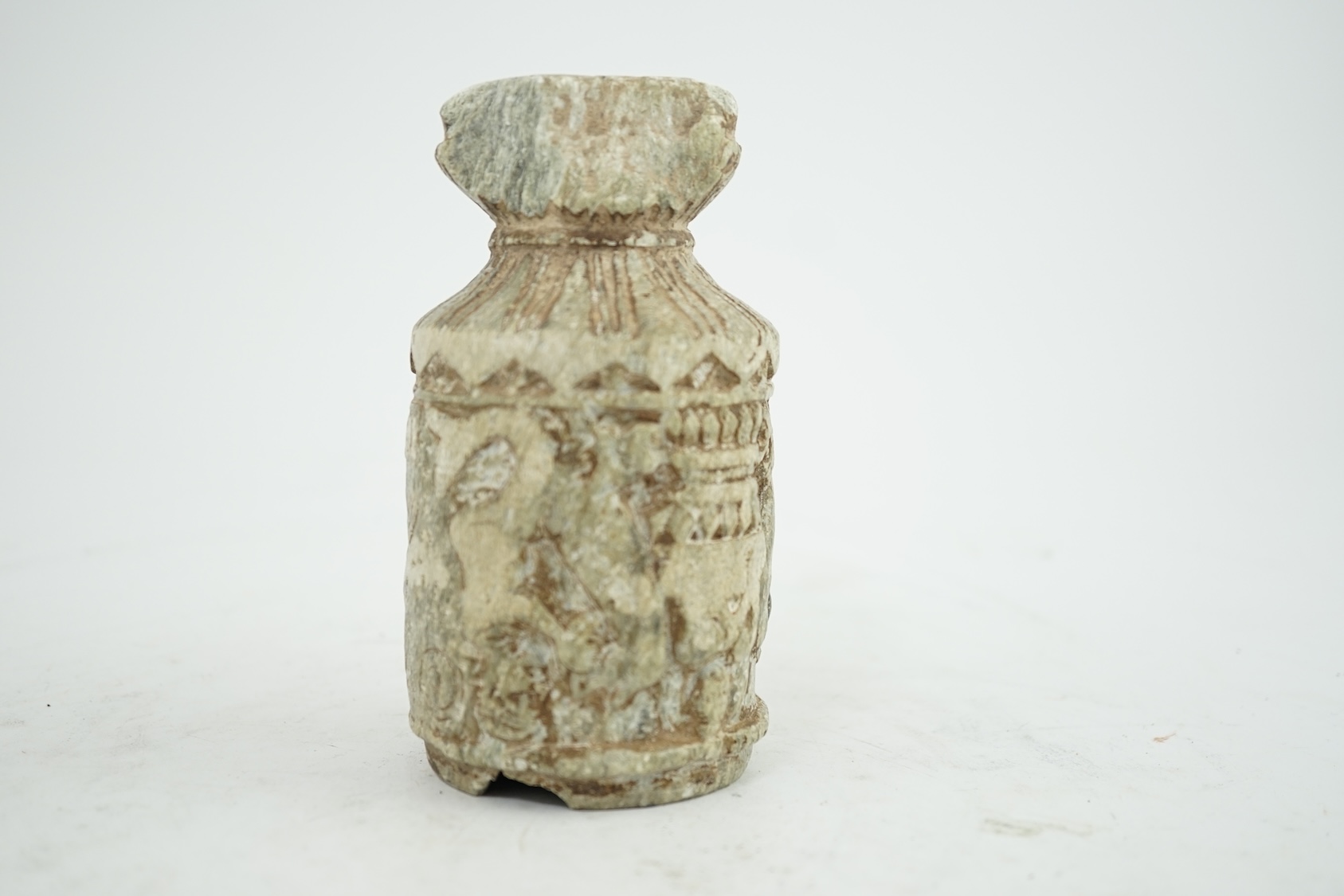 A Gandharan Buddhist carved schist stem cup